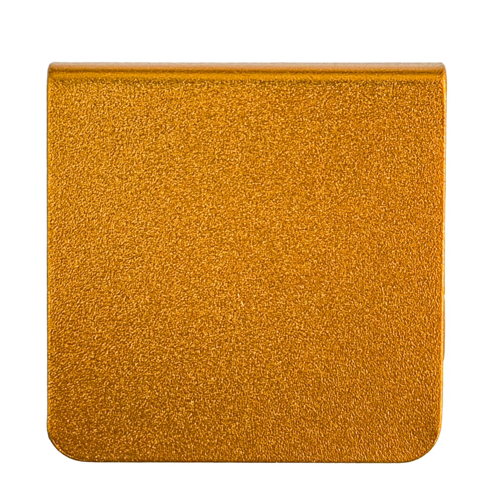 A square-shaped object with a textured surface, resembling a piece of paper or a similar material.