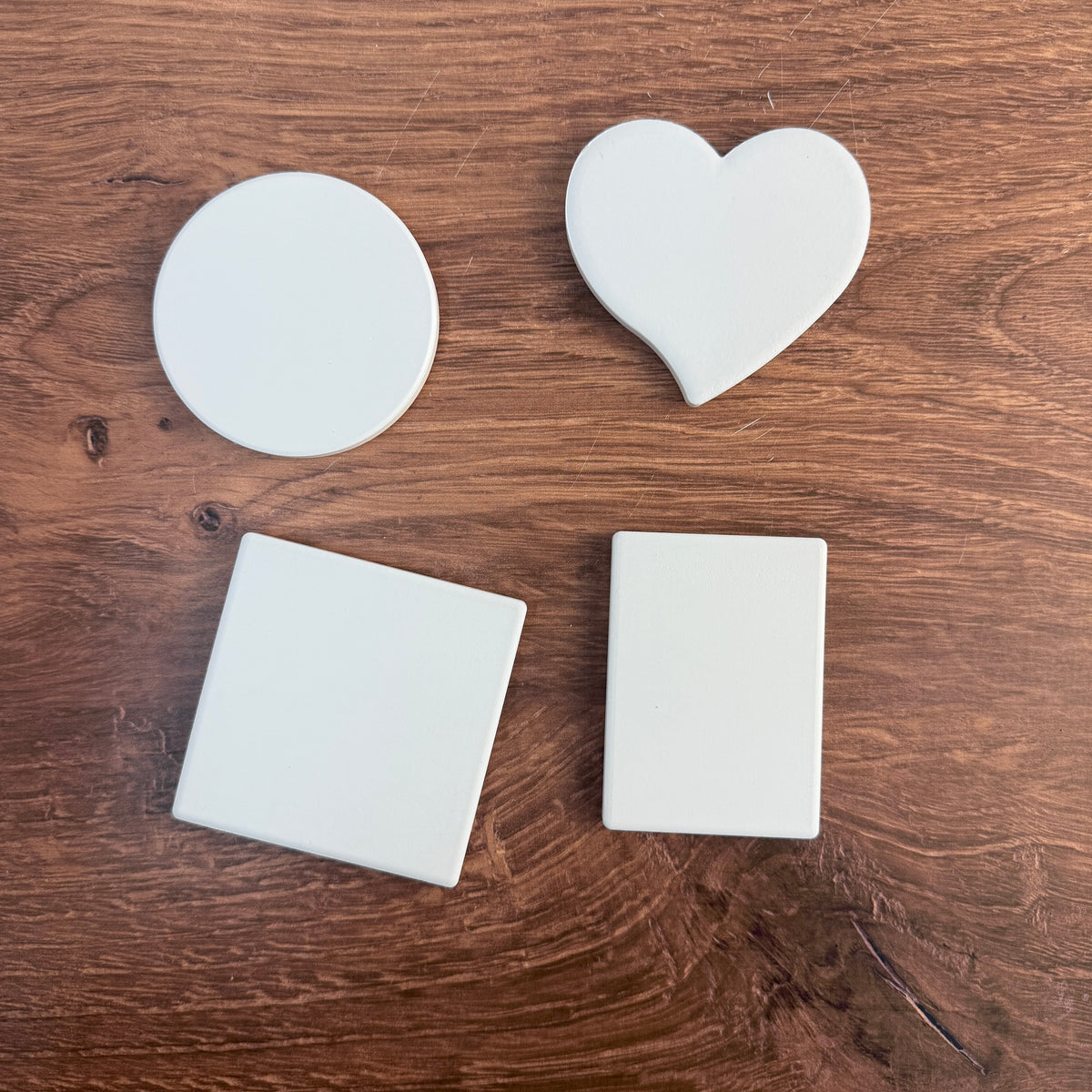Bright white ceramic magnet blanks for UV printing in round, heart, square and rectangle shapes