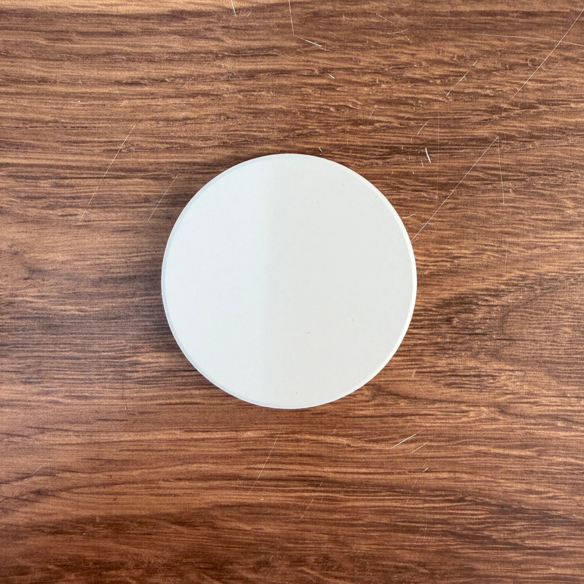 Round ceramic magnet blank with bright white UV print coating, 6.6 cm across