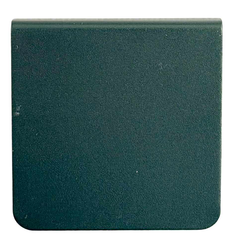 A dark green, textured surface with a flat, uniform appearance.