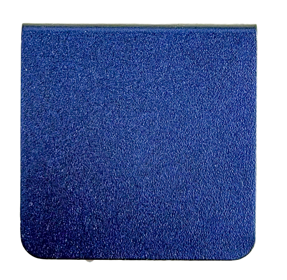 The image is a close-up of a solid blue surface, possibly a piece of fabric or a tile.